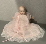 Vintage Grace Story Putnam Bye Lo Repro. Infant Doll Pink Dress. Fixed Price $50.00.