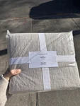 Parachute Linen Top Sheet Full/queen Size. Bone Color. Fixed Price $99.00.