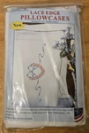 Jack Dempsey Lace Edge Pillowcases Stamp Hand Embroidery Hearts & Ribbon. Fixed Price $18.00.