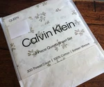 Calvin Klein Floating Petals Floral Beige White 300TC Sateen Xdp Queen Sheet Set. Fixed Price $74.99.