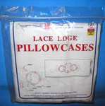 Jack Dempsey Daisy Circles & Ribbons #192 Lace Edge Pillowcases For Embroidery. Fixed Price $9.00.