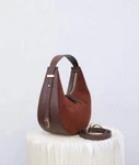 Luxe Harmony Versatile Bag With An Adjustable Strap. Fixed Price $135.00.