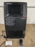 Lasko 1500-WATT 20 In. Black Electric Heater With Adjus Louvers, Timer, Remote. Fixed Price $32.99.