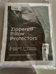 Niagara White Stripped Zippered Pillow Protector Machine Washable Queen Size. Fixed Price $16.00.