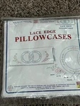 Jack Dempsey Daisy Circles & Ribbons #192 Lace Edge Pillowcases For Embroidery. Fixed Price $9.99.